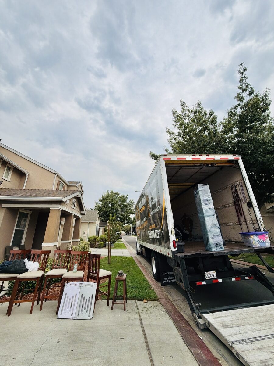 Pack And Go moving truck loading household furniture in Fresno